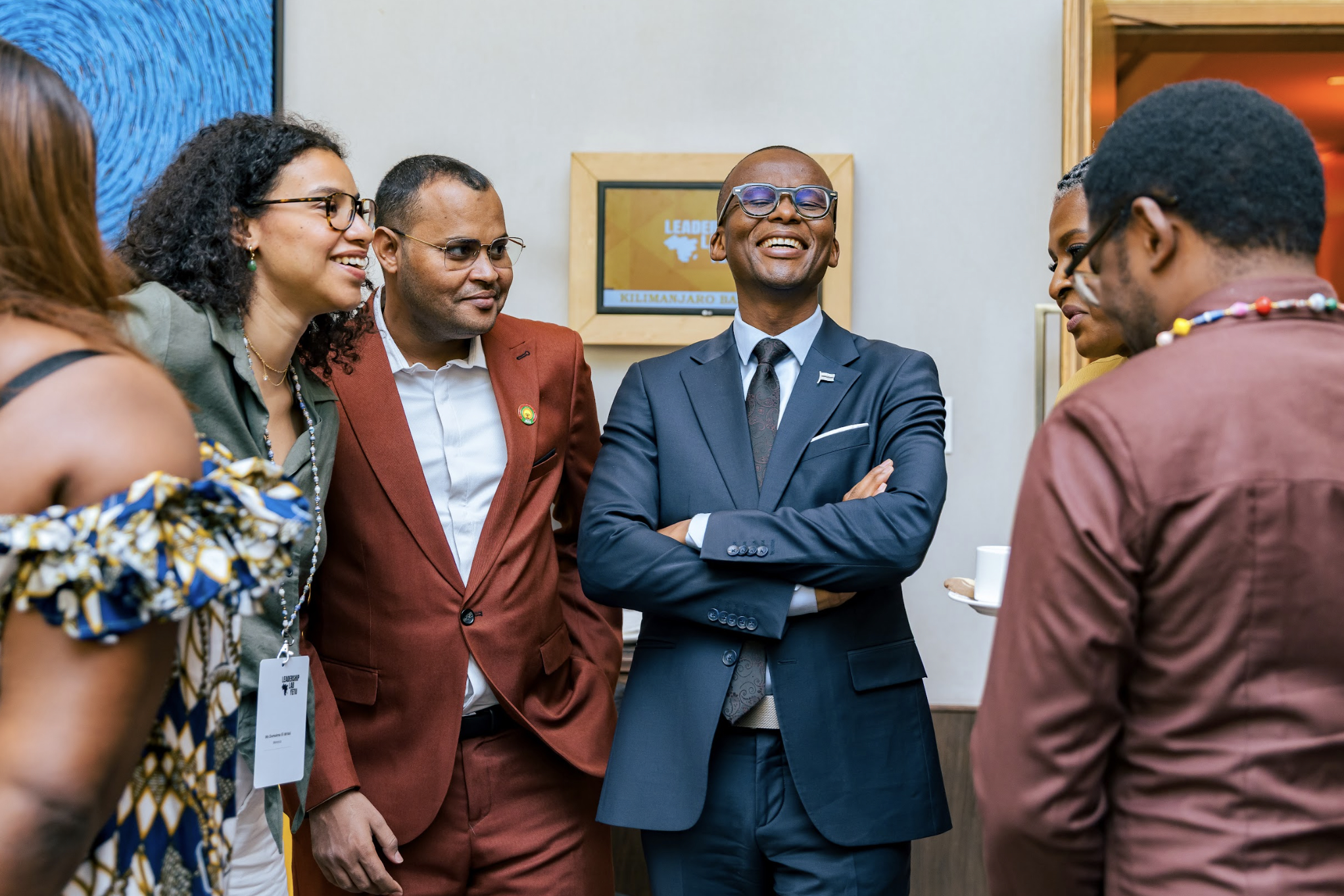 Vice President of Botswana, Ndaba Nkosinathi Gaolathe, laughing with participants at Leadership Lab Yetu's launch